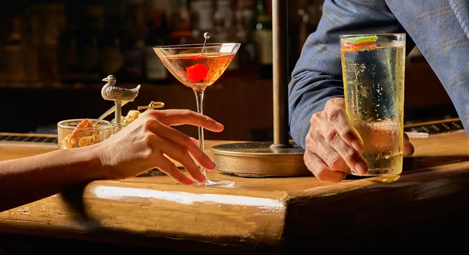 Two drinks served across the bar